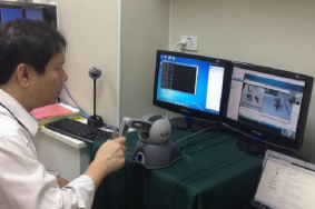 An Experiment on Communication Assessment for an Ongoing Tele-Surgical Robot Research in Thailand